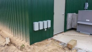 Four 30 AMP electrical hookup boxes at TNT, Midland MI