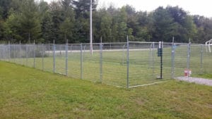 Fenced in potty and exercise area at TNT Dog Center, Midland MI