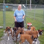 Lisa Lundahl, owner of TNT Agility, and her 5 boxer dogs