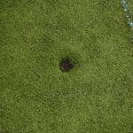 Indent where divet was removed in soccer turf at Avanti's dome