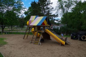 Playground structure and swings