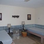 Lodging room with 2 single beds at Yellowstone Dog Sports, Roberts MT