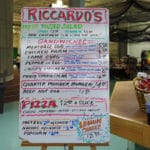 large sign with Riccardo's pizza and delli specials at Niles Wellness Center, Niles OH