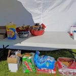 chips and other snacks on table and underneath for volunteer workers at East Idaho Fairgrounds-BlackfootID