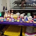 Maxie Foster vendor booth with scented candles and candle burners