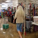 vendor booths with dog leashes and other canine items