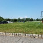 Dog Potty Area, large grassy field with waste cans, Nex Level Arena, Flemington NJ