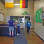 Trial attendees and workers socializing in the lobby Soccer World, Rochester MN