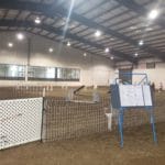 Agility ring corner entry gate and gate sheet at Lane County Fairgrounds, Eugene OR