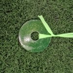 Turf Close-Up with weight and green tape attached at Silver Street Park, New Albany IN