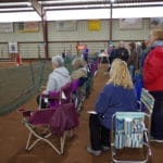 Trial attendees watch the ring in folding chairs in front of the ring at South St. Louis County Fairgrounds, Dirt Floor Arena, Proctor MN