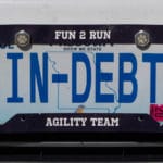 "IN-DEBT" license plate National Equestrian Center, Lake St Louis MO