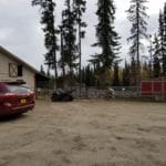 Dirt parking lot beside trial building Camp Li-Wa, Fairbanks AK