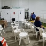 Viewing area with white plastic chairs in rows facing trial ring Dog Training Club of St. Petersburg, St. Petersburg FL