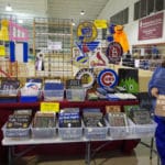 Pam from Pallet Works showing off pallet signs National Equestrian Center, Lake St Louis MO