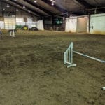 two warm up jumps on dirt floor at -MTSU-Livestock-Center-MurfreesboroTN