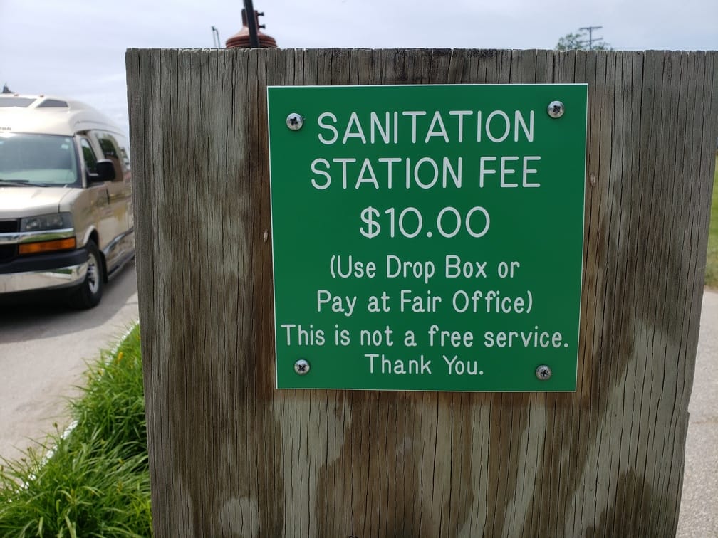 sanitation dump fee sign at midland county fairgrounds