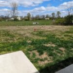 VIew from crating entry door of dog potty area, True Turf with 5M flooring and attached foam backing.