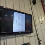 monitor high up on wall showing running order - agility at the farm, campton hills, il