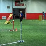 agility ring showing open garage door for storing equipment - agility at the farm, campton hills, IL